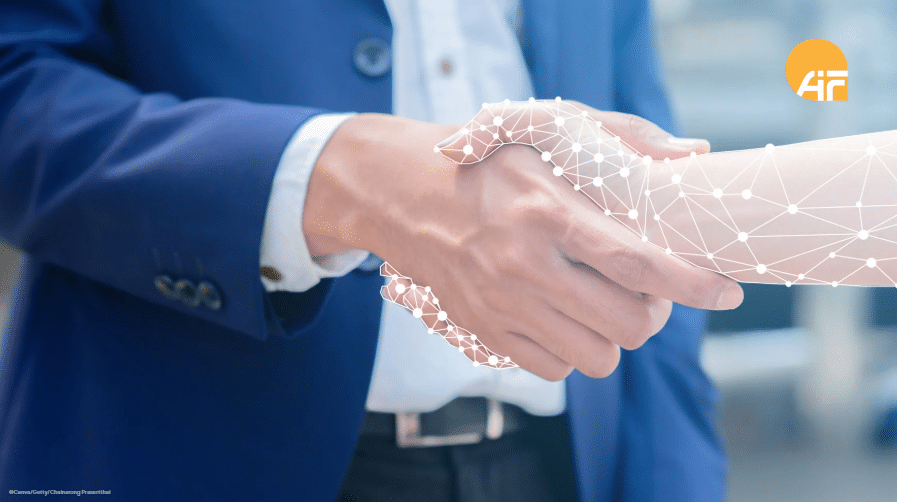 Zwei Hände, die sich schütteln.